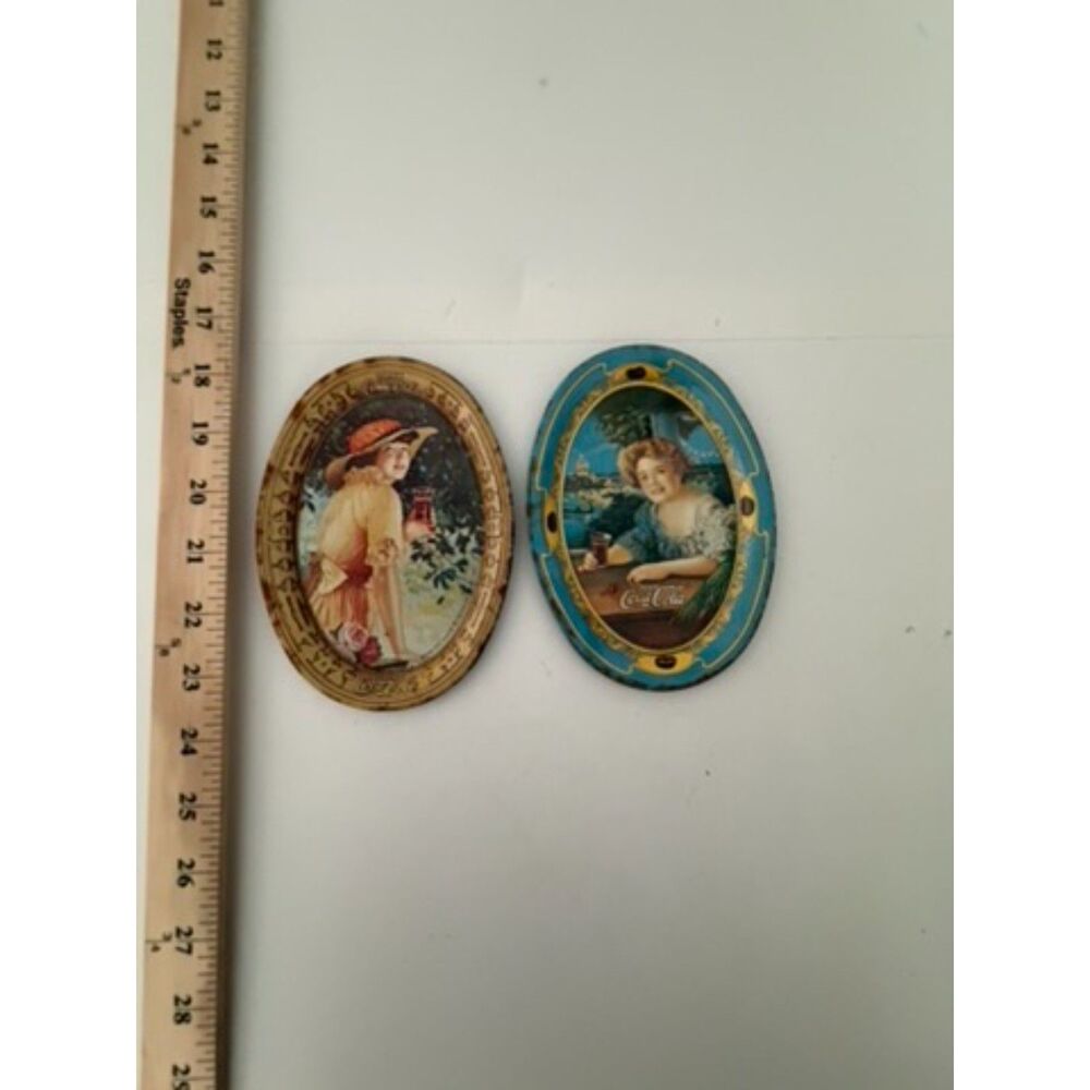 Vtg. pair of Coca cola 1973 oval advertising tin tip trays